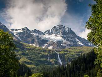 In the upper Lauterbrunnen Valley, the Schmadribach Falls flow through unspoiled natural scenery.