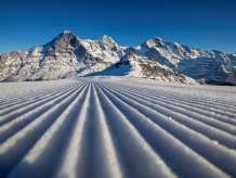 Skipiste mit Eiger im Hintergrund