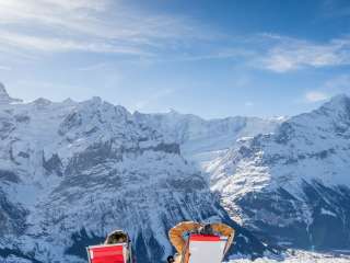 Enjoy the sun on First while relaxing in a lounge chair.