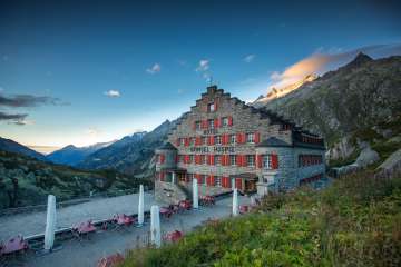 The Grimsel Hospiz Hotel at dusk.