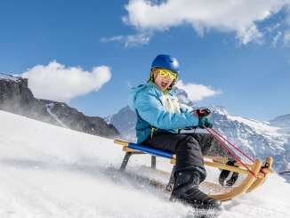 Sled ride from First to Faulhorn to Bussalp. The route offers a breathtaking panoramic view of the Eiger and the surrounding mountain range.