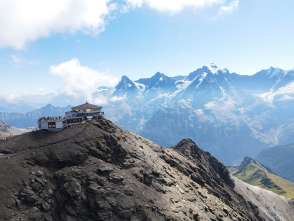 Aerial view of the Schilthorn and Piz Gloria. The Eiger, Mönch, and Jungfrau can be seen in the background.