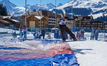 From the slopes, across a swimming pool, and back into the snow—all on skis or a snowboard.
