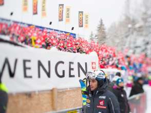 A snapshot from the Lauberhorn Race in Wengen. Spectators cheer on the skiers in the finish area.
