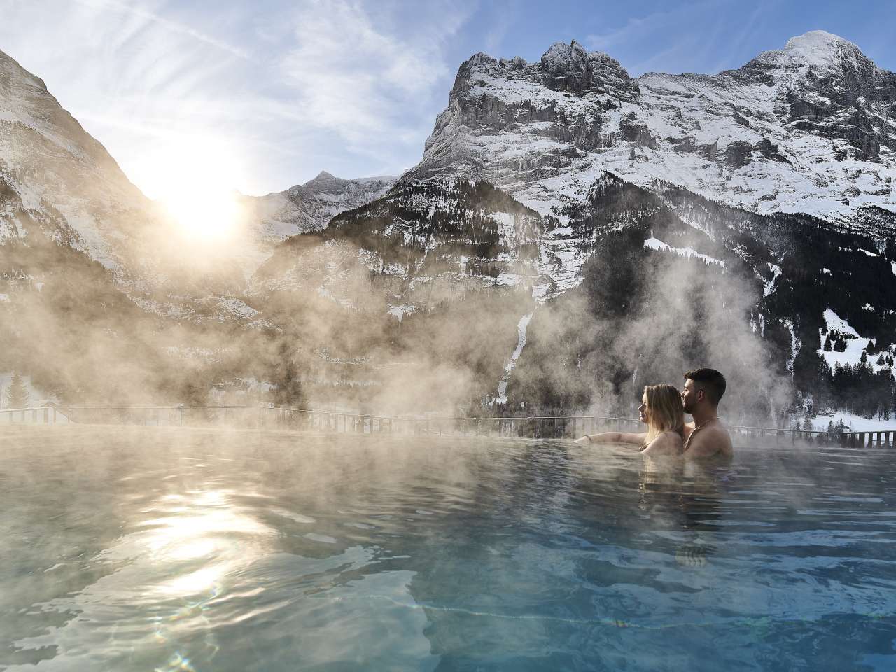 The infinity pool at the Hotel Spinne in Grindelwald offers a unique view of the snow-covered mountains of Grindelwald.