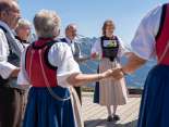 At the Mountain Spring Festival on the Männlichen, people dance in traditional costumes.