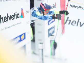 A snapshot from the Lauberhorn Race in Wengen. The skier looks out of the starting gate just before his run.